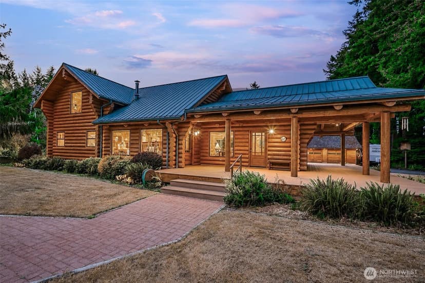 Property photo for 6133 Puget Beach Road Ne, Olympia