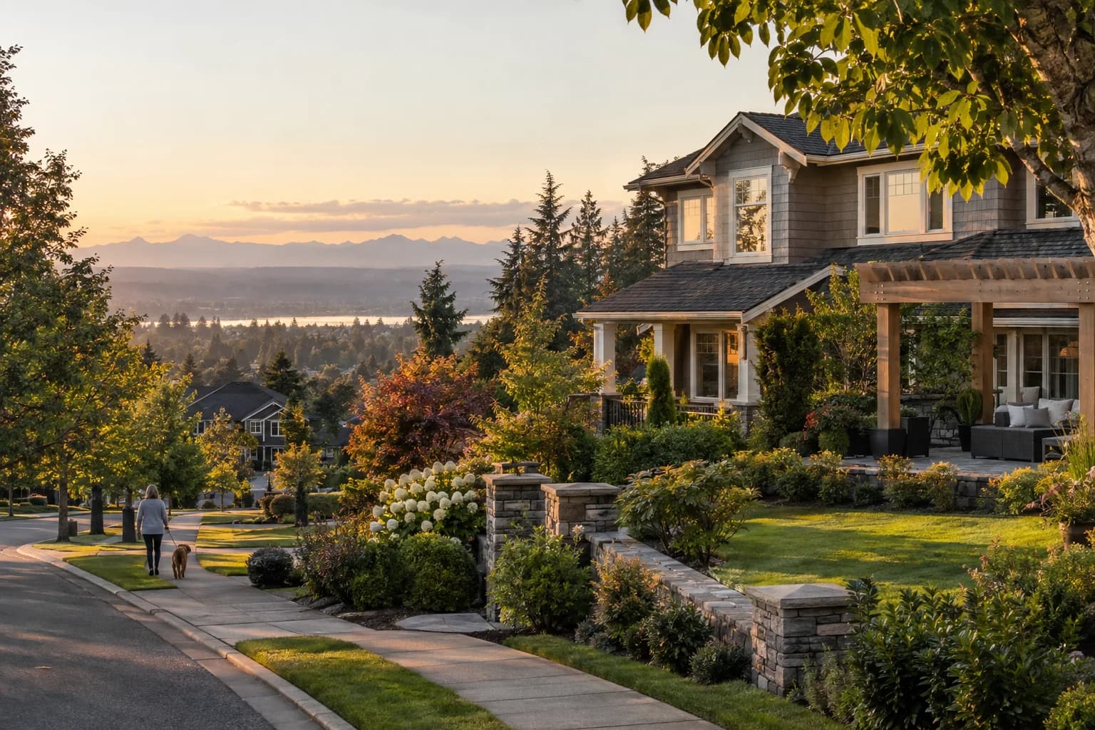 Well-kept 2000s two-story with a pergola patio in Covington, Washington, with a leafy suburban street with mature maples and lush lawns