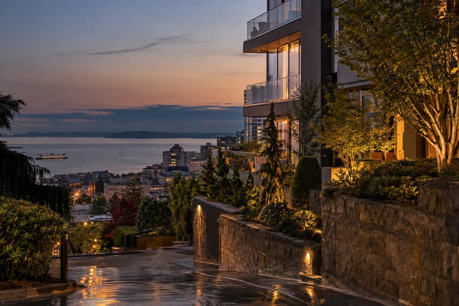 Urban high-rise street approach framed by trees and stone in Seattle — RexMont Real Estate