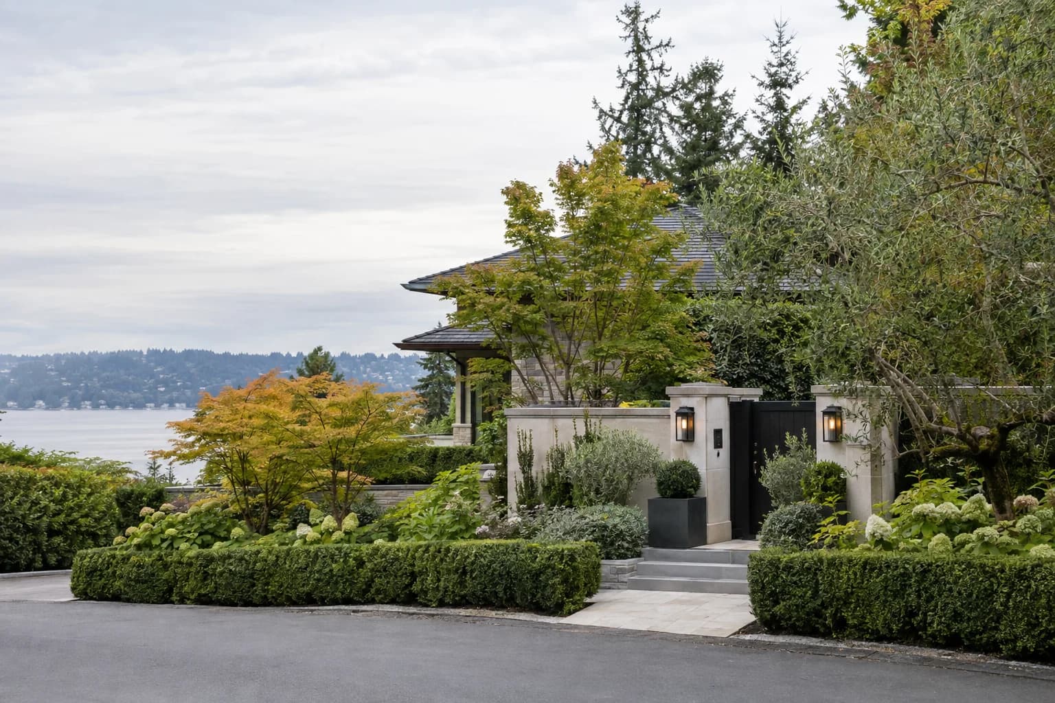Quiet affluent residential street with a refined front entry and mature hedges in Hunts Point — RexMont Real Estate