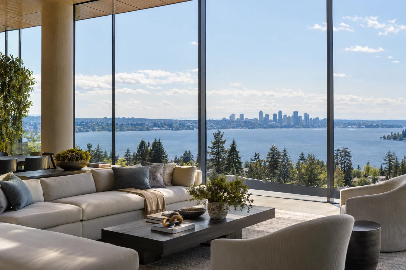 Amenity lounge with window wall and restrained city context in Bellevue — RexMont Real Estate